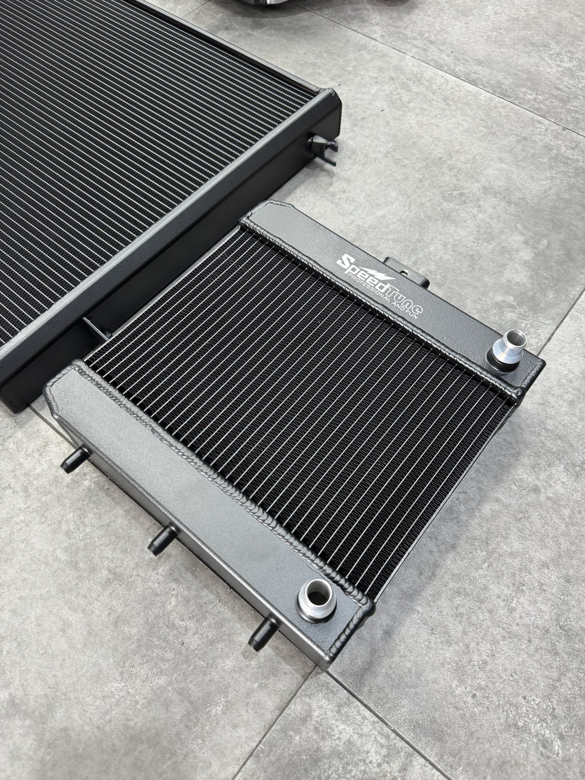S55 auxiliary radiators in black — left and right pair